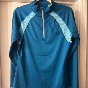 New Balance Teal Half-Zip With Light Blue Details and Hand Warmer Cuffs
